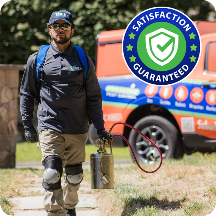 pest control technician walking from company truck